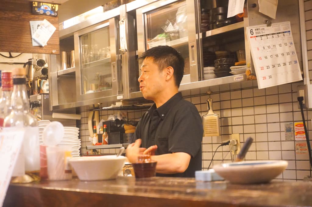 布施酒場かい　店主